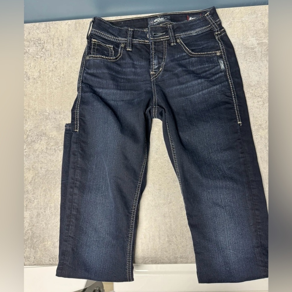 Woman’s silver jeans